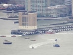 This aerial image taken from video shows rescue vessels on site of helicopter crash on the Hudson River in New York, Thursday, April 10, 2025. (WABC-TV via AP) This aerial image taken from video shows rescue vessels on site of helicopter crash on the Hudson River in New York, Thursday, April 10, 2025. (WABC-TV via AP)