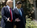 US President Donald Trump (L) and Chinese President Xi Jinping (R) walk together at the Mar-a-Lago estate in Palm Beach, Florida. US President Donald Trump (L) and Chinese President Xi Jinping (R) walk together at the Mar-a-Lago estate in Palm Beach, Florida.