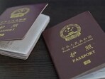 A handout video grab taken on April 10, 2025 from footage published on the official Facebook page of Ukrainian President Volodymyr Zelensky shows alleged Chinese passports after Zelensky said on April 8, 2025, that two Chinese nationals had been captured by Ukrainian forces in the Donetsk region.
(Photo by Facebook account of Volodymyr Zelensky / AFP) / RESTRICTED TO EDITORIAL USE - MANDATORY CREDIT "AFP PHOTO / FACEBOOK ACCOUNT OF VOLODYMYR ZELENSKY" - HANDOUT - NO MARKETING NO ADVERTISING CAMPAIGNS - DISTRIBUTED AS A SERVICE TO CLIENTS - AFP CANNOT INDEPENDENTLY VERIFY THE AUTHENTICITY OR LOCATION, DATE, AND CONTENT OF THESE IMAGES. / A handout video grab taken on April 10, 2025 from footage published on the official Facebook page of Ukrainian President Volodymyr Zelensky shows alleged Chinese passports after Zelensky said on April 8, 2025, that two Chinese nationals had been captured by Ukrainian forces in the Donetsk region.
(Photo by Facebook account of Volodymyr Zelensky / AFP) / RESTRICTED TO EDITORIAL USE - MANDATORY CREDIT "AFP PHOTO / FACEBOOK ACCOUNT OF VOLODYMYR ZELENSKY" - HANDOUT - NO MARKETING NO ADVERTISING CAMPAIGNS - DISTRIBUTED AS A SERVICE TO CLIENTS - AFP CANNOT INDEPENDENTLY VERIFY THE AUTHENTICITY OR LOCATION, DATE, AND CONTENT OF THESE IMAGES. /