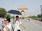 Visitors at the India Gate in New Delhi on Wednesday, April 9, 2025. Visitors at the India Gate in New Delhi on Wednesday, April 9, 2025.