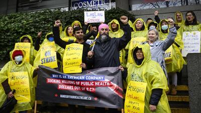 Canada NDP leader Jagmeet Singh poses for a photo with striking LifeLabs workers, BC General Employees' Union members and NDP candidate Sukhi Singh Sahota, centre left, on the picket line during a campaign stop in Vancouver, British Columbia, Canada, on April 8. (AP) Canada NDP leader Jagmeet Singh poses for a photo with striking LifeLabs workers, BC General Employees' Union members and NDP candidate Sukhi Singh Sahota, centre left, on the picket line during a campaign stop in Vancouver, British Columbia, Canada, on April 8. (AP)