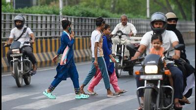 In the absence of FOBs, people often cross roads amid fast-moving traffic, at significant personal risk. (Sunil Ghosh/HT Photo) In the absence of FOBs, people often cross roads amid fast-moving traffic, at significant personal risk. (Sunil Ghosh/HT Photo)