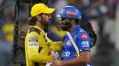 Rohit Sharma , right, greets MS Dhoni (AP) Rohit Sharma , right, greets MS Dhoni (AP)