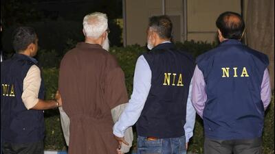 Mumbai terror attack accused Tahawwur Hussain Rana with NIA officials at the IGI Airport, in New Delhi. (NIA) Mumbai terror attack accused Tahawwur Hussain Rana with NIA officials at the IGI Airport, in New Delhi. (NIA)