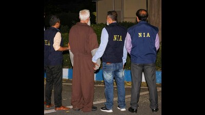 Mumbai terror attack accused Tahawwur Hussain Rana with NIA officials upon his arrival at the IGI Airport, in New Delhi. (PTI PHOTO) Mumbai terror attack accused Tahawwur Hussain Rana with NIA officials upon his arrival at the IGI Airport, in New Delhi. (PTI PHOTO)