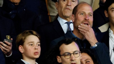 Soccer Football - Champions League - Quarter Final - First Leg - Paris St Germain v Aston Villa - Parc des Princes, Paris, France - April 9, 2025 Britain's Prince William and his son Prince George are seen in the stands before the match REUTERS/Stephanie Lecocq     TPX IMAGES OF THE DAY (REUTERS)