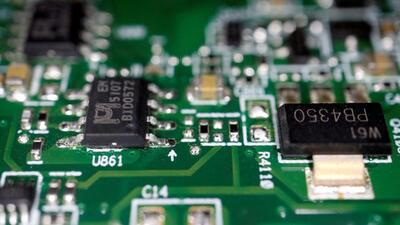 Semiconductor chips on a printed circuit board. (Reuters File Photo) Semiconductor chips on a printed circuit board. (Reuters File Photo)