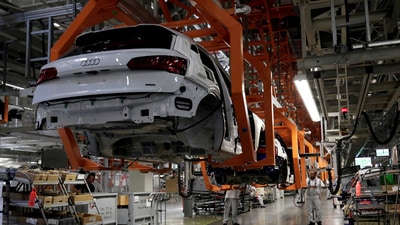 Employees work at an Audi Q5 2.0 production line of the German car manufacturer's plant during a media tour in San Jose Chiapa, Mexico. (REUTERS/File)