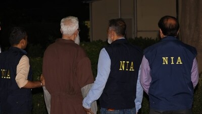 Tahawwur Rana was officially arrested by the NIA on Thursday evening right after arriving at Delhi airport from the US, escorted by senior NIA and NSG officials on a special flight from Los Angeles. (NIA) Tahawwur Rana was officially arrested by the NIA on Thursday evening right after arriving at Delhi airport from the US, escorted by senior NIA and NSG officials on a special flight from Los Angeles. (NIA)