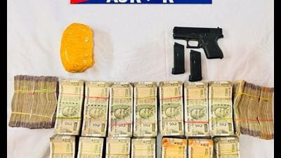 Three accused were arrested and 500 gm heroin, a Glock 9 mm pistol with two magazines and  ₹33 lakh seized.