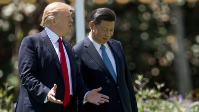 US President Donald Trump (L) and Chinese President Xi Jinping (R) walk together at the Mar-a-Lago estate in Palm Beach, Florida. (AFP) US President Donald Trump (L) and Chinese President Xi Jinping (R) walk together at the Mar-a-Lago estate in Palm Beach, Florida. (AFP)