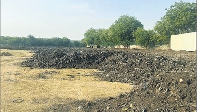 The site in Faridabad’s Pali village where the Pune-based company has dumped the legacy waste instead of treating it. (Parveen Kumar/HT photo) (HT) The site in Faridabad’s Pali village where the Pune-based company has dumped the legacy waste instead of treating it. (Parveen Kumar/HT photo) (HT)