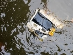 Debris floats in the water at the scene where a helicopter crashed in the Hudson River in Jersey City Debris floats in the water at the scene where a helicopter crashed in the Hudson River in Jersey City