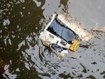 Debris floats in the water at the scene where a helicopter crashed in the Hudson River in Jersey City Debris floats in the water at the scene where a helicopter crashed in the Hudson River in Jersey City