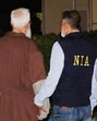 NIA with Tahawwur Rana after the successful extradition on Thursday. (Photo from X)