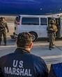 US Marshals transfer the custody of Tahawwur Hussain Rana, a key accused in the 26/11 Mumbai terror attacks, to the NIA team, in California, USA on Tuesday. (US Marshals Service/PTI)