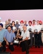 Winners of the Milkha Singh Memorial Golf Tournament posing with trophy at Chandigarh Golf Club on Thursday. (Ravi Kumar/HT)