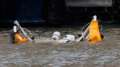 An object floats at the scene of a helicopter crash on the Hudson River near lower Manhattan in New York, as seen from Newport, New Jersey, U.S., April 10, 2025. (REUTERS)
