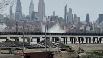 Water splashes after a helicopter fell on the Hudson River near lower Manhattan, as seen from Jersey City, New Jersey, U.S., April 10, 2025 in this screengrab obtained from a video. Kimber Morais/TMX/via REUTERS  THIS IMAGE HAS BEEN SUPPLIED BY A THIRD PARTY. MANDATORY CREDIT. NO RESALES. NO ARCHIVES. (KIMBER MORAIS/TMX via REUTERS)