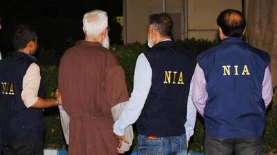NIA with Tahawwur Rana after the successful extradition on Thursday. (Photo from X) NIA with Tahawwur Rana after the successful extradition on Thursday. (Photo from X)