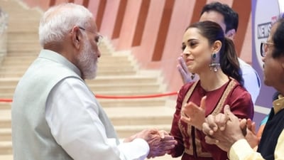 Nushrratt Bharuccha met PM Modi at an event recently. Nushrratt Bharuccha met PM Modi at an event recently.