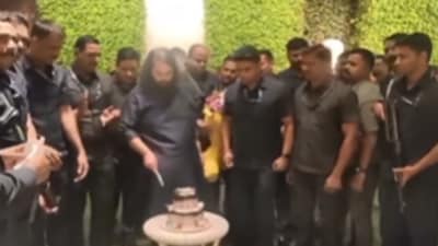 Anant Ambani cut his 30th birthday cake with bodyguards. (Instagram/ambani_update) Anant Ambani cut his 30th birthday cake with bodyguards. (Instagram/ambani_update)