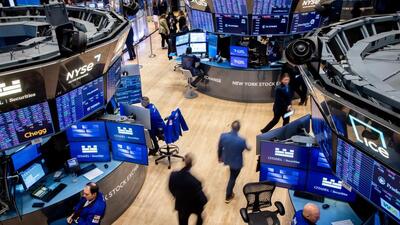 Traders work on the floor of the New York Stock Exchange in New York, US, on Thursday. (Bloomberg) Traders work on the floor of the New York Stock Exchange in New York, US, on Thursday. (Bloomberg)