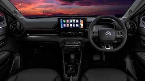 The cabin continues with the black theme with all-black upholstery, accents, and contrast red stitching The cabin continues with the black theme with all-black upholstery, accents, and contrast red stitching