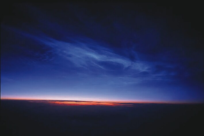 Noctilucent clouds above Alaska. (NASA) Noctilucent clouds above Alaska. (NASA)