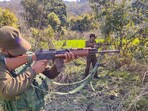 Security personnel during a search operation near LoC forest area, in Akhnoor sector in Jammu.