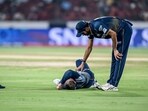 Gujarat Titans' Washington Sundar (R) checks on his teammate Glenn Phillips during the Indian Premier League (IPL) Twenty20 cricket match between Sunrisers Hyderabad and Gujarat Titans Gujarat Titans' Washington Sundar (R) checks on his teammate Glenn Phillips during the Indian Premier League (IPL) Twenty20 cricket match between Sunrisers Hyderabad and Gujarat Titans