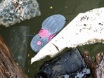 A shoe is seen floating near where a helicopter crashed on the Hudson River on April 11, 2025 in Jersey City, New Jersey. &nbsp;(Photo by EDUARDO MUNOZ ALVAREZ / GETTY IMAGES NORTH AMERICA / Getty Images via AFP)