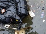 NYPD SCUBA divers collect floating debris near where a helicopter crashed in the Hudson River on April 11, 2025 in Jersey City, New Jersey. NYPD SCUBA divers collect floating debris near where a helicopter crashed in the Hudson River on April 11, 2025 in Jersey City, New Jersey.