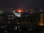 A drone explodes in the sky over the city during a Russian drone strike, amid Russia's attack on Ukraine, in Kyiv, Ukraine April 12, 2025. 