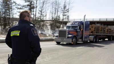 A Canadian border services superintendent directs a truck carrying lumber while entering Canada at the Canada Border Service Agency (CBSA) border crossing with the United States in Stanstead, Quebec, Canada (Photo for representative purpose only). (REUTERS) A Canadian border services superintendent directs a truck carrying lumber while entering Canada at the Canada Border Service Agency (CBSA) border crossing with the United States in Stanstead, Quebec, Canada (Photo for representative purpose only). (REUTERS)