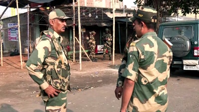 Security personnel stand guard after violent protests against the Waqf (Amendment) Act, at Dhuliyan in Murshidabad on Saturday. Three people killed in the violent protests. (ANI) Security personnel stand guard after violent protests against the Waqf (Amendment) Act, at Dhuliyan in Murshidabad on Saturday. Three people killed in the violent protests. (ANI)