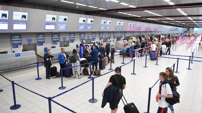 Instead of the usual check-in process, passengers will upload their passports to their phones and pass through the airport seamlessly if the new tech is implemented. (Representational image) Instead of the usual check-in process, passengers will upload their passports to their phones and pass through the airport seamlessly if the new tech is implemented. (Representational image)