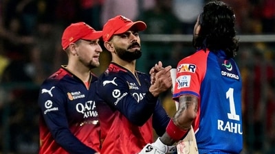 Delhi Capitals' KL Rahul (R) is congratulated by Royal Challengers Bengaluru's Virat Kohli (C) for his innings at the end of the Indian Premier League (IPL) Twenty20 match (AFP) Delhi Capitals' KL Rahul (R) is congratulated by Royal Challengers Bengaluru's Virat Kohli (C) for his innings at the end of the Indian Premier League (IPL) Twenty20 match (AFP)