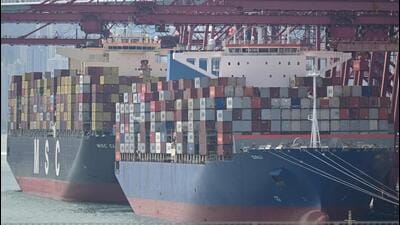 Container ships are seen docked at Kwai Chung Container terminal in Hong Kong. (AFP)
