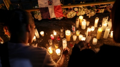 People attend a candlelight vigil for the victims of Jet Set nightclub roof collapse, in Santo Domingo, Dominican Republic, April 11, 2025. (REUTERS)