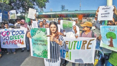 Thane, India - April 12, 2025: Volunteers of the Muse Foundation (NGO) protested at Manpada junction GB road thane against the rampant tree Cutting for road widening work on thane Ghodbunder Road within the Thane Municipal Corporation limits. Volunteers appealed to stop tree Cutting ,in Thane,in Mumbai, India, on, Saturday, April -12, 2025. ( Praful Gangurde /HT Photo ) Thane, India - April 12, 2025: Volunteers of the Muse Foundation (NGO) protested at Manpada junction GB road thane against the rampant tree Cutting for road widening work on thane Ghodbunder Road within the Thane Municipal Corporation limits. Volunteers appealed to stop tree Cutting ,in Thane,in Mumbai, India, on, Saturday, April -12, 2025. ( Praful Gangurde /HT Photo )