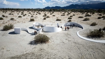 French-American artist Sarah Meyohas' piece “Truth Arrives in Slanted Beams,” another aerial view in the Coachella Valley near Desert Hot Springs, California, on March 7, 2025. (Photo by Valerie MACON / AFP) (AFP) French-American artist Sarah Meyohas' piece “Truth Arrives in Slanted Beams,” another aerial view in the Coachella Valley near Desert Hot Springs, California, on March 7, 2025. (Photo by Valerie MACON / AFP) (AFP)