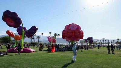 French design collective Uchronia's "Le Grand Bouquet" large-scale floral art installation is displayed during the 2025 Coachella Valley Music and Arts Festival at Empire Polo Club on April 11, 2025 in Indio, California. (Photo by VALERIE MACON / AFP) / RESTRICTED TO EDITORIAL USE (AFP) French design collective Uchronia's "Le Grand Bouquet" large-scale floral art installation is displayed during the 2025 Coachella Valley Music and Arts Festival at Empire Polo Club on April 11, 2025 in Indio, California. (Photo by VALERIE MACON / AFP) / RESTRICTED TO EDITORIAL USE (AFP)