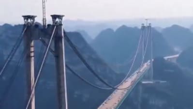 The Huajiang Grand Canyon Bridge costs £ 216,000,000 and will open in June (@CollinRugg/X) The Huajiang Grand Canyon Bridge costs £ 216,000,000 and will open in June (@CollinRugg/X)