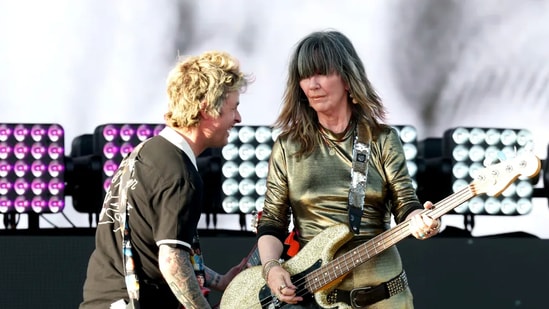 Billie Joe Armstrong sings "Head Over Heels" with The Go-Go's during their Friday night performance at the Outdoor Theatre stage.(.(Photo by Frazer Harrison/Getty Images for Coachella))