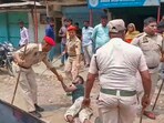 Police baton-charge protesters during a demonstration over the Waqf Act in Silchar. Police baton-charge protesters during a demonstration over the Waqf Act in Silchar.