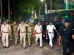 Police and security personnel keep a vigil at an area amid protests over the Waqf (Amendment) Act, in Murshidabad district, West Bengal, Saturday, April 12, 2025. Police and security personnel keep a vigil at an area amid protests over the Waqf (Amendment) Act, in Murshidabad district, West Bengal, Saturday, April 12, 2025.
