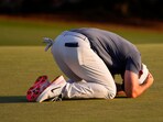 Rory McIlroy, of Northern Ireland, reacts after winning in a playoff against Justin Rose after the final round at the Masters golf tournament, Sunday, April 13, 2025, in Augusta, Ga.