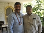 Tikaram Jully with a supporter.