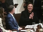 Elon Musk (R) attends cabinet meeting with US President Donald Trump in the Cabinet Room of the White House on April 10, 2025, in Washington, DC. Trump on Thursday warned of the "transition cost" from his tariff policies, as Wall Street stocks fell again over the worsening trade war with China. (Photo by Brendan SMIALOWSKI / AFP) Elon Musk (R) attends cabinet meeting with US President Donald Trump in the Cabinet Room of the White House on April 10, 2025, in Washington, DC. Trump on Thursday warned of the "transition cost" from his tariff policies, as Wall Street stocks fell again over the worsening trade war with China. (Photo by Brendan SMIALOWSKI / AFP)